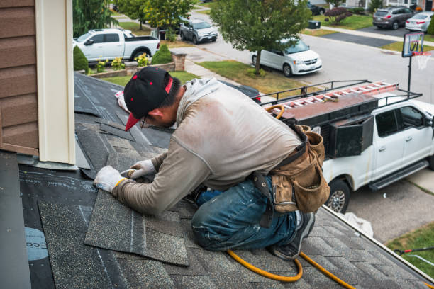 Professional Roofing technician working in Pond Eddy, NY